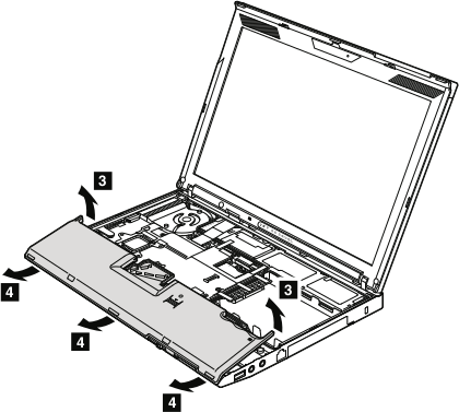 Slide the palm rest down and away from the laptop to remove safely